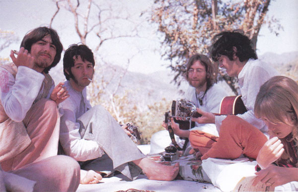 The Beatles in India 1968 George Harrison, Paul McCartney, John Lennon and Donovan playing guitar